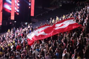 Crowd holding Canadian flag at Invictus Games